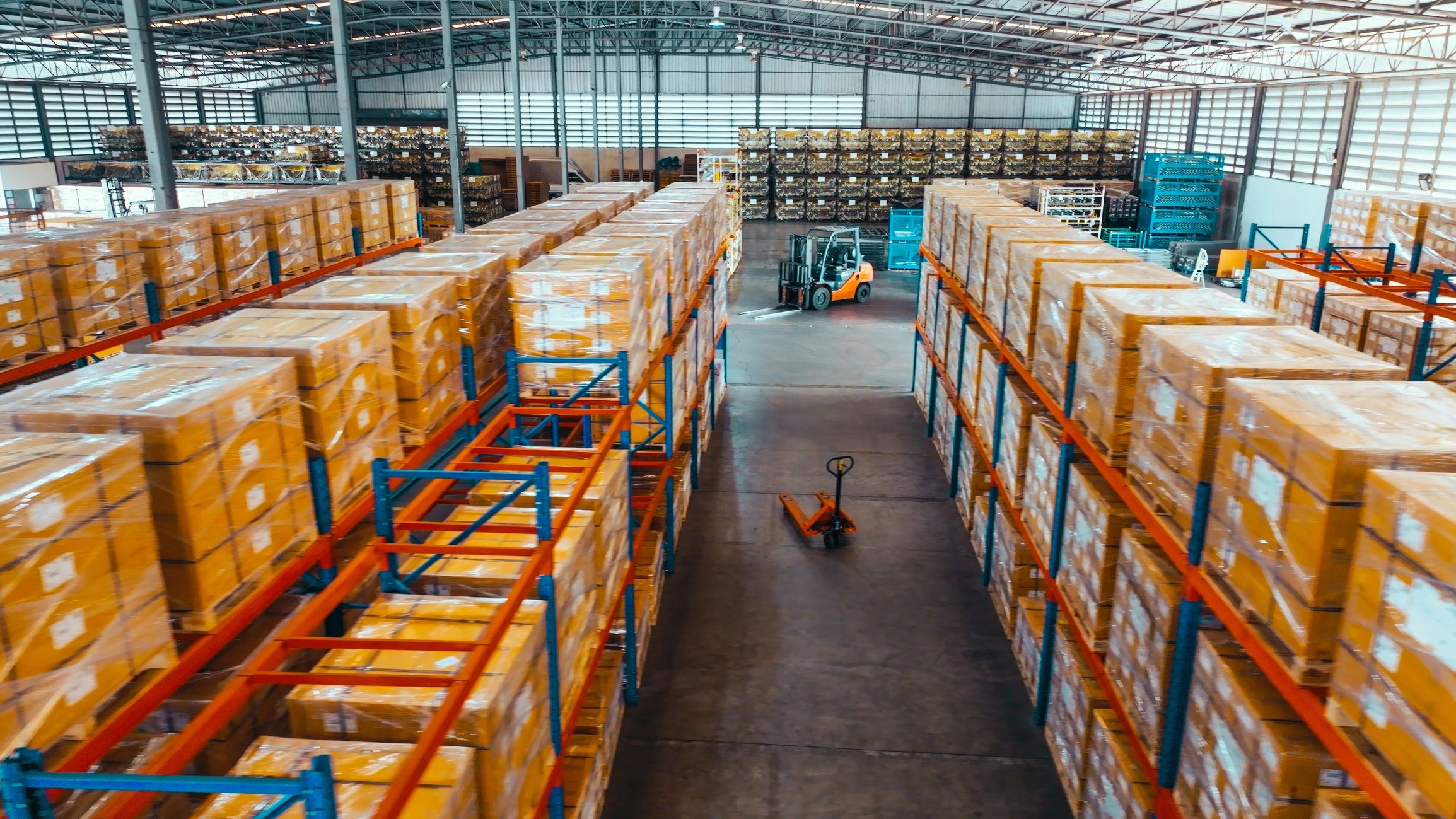 Warehouse shelves with packed boxes ready to ship